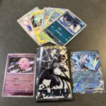 セブンイレブンで購入した「ブラックボルト」パックを開封したところ、目を引いたのはモンスターボールミラー仕様のムンナと、RRのキュレムexでした！ まずムンナは、