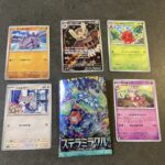 セブンイレブンで購入した「スカーレット＆バイオレット 拡張パック ステラミラクル」、今回はなんとARのヨルノズクが登場！ パックを開けた瞬間、キラリと光る姿に思