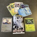 セブンイレブンで買った「ホワイトフレア」を開封。今回のモンボミラーはギアルでした。 カード全体にキラっとした光沢があり、背景の風景も相まって、無機質でありながら